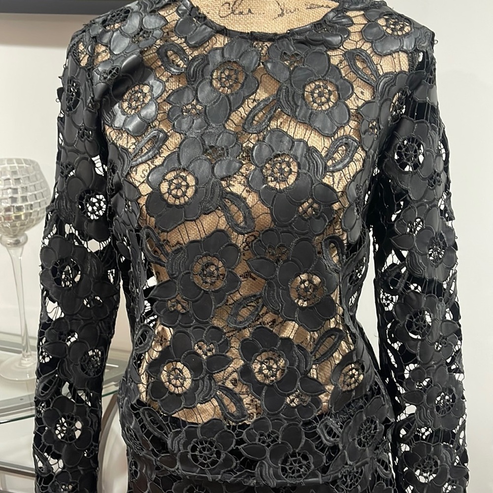 Two pieces cut out lace looking